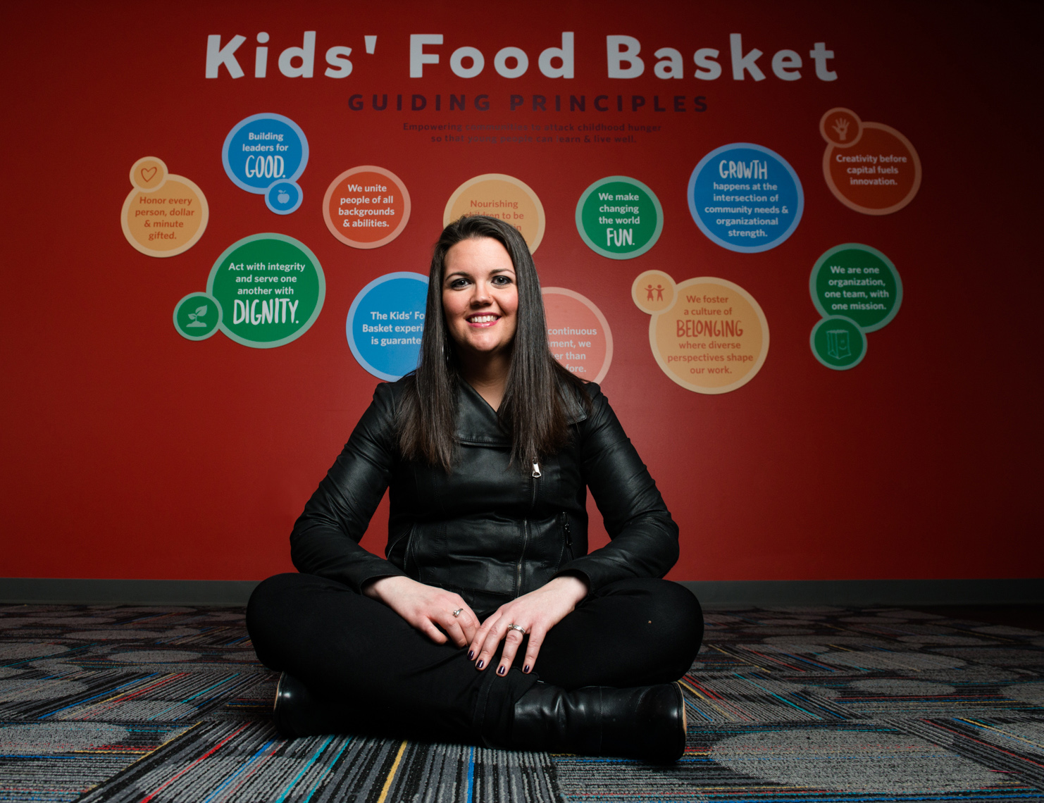 portrait of Bridget Clark-Whitney of Kids Food Basket in the boardroom