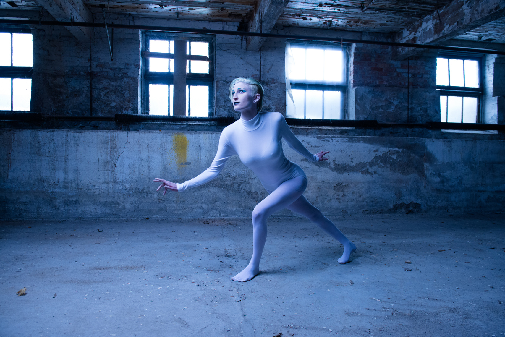 female model in an warehouse basement